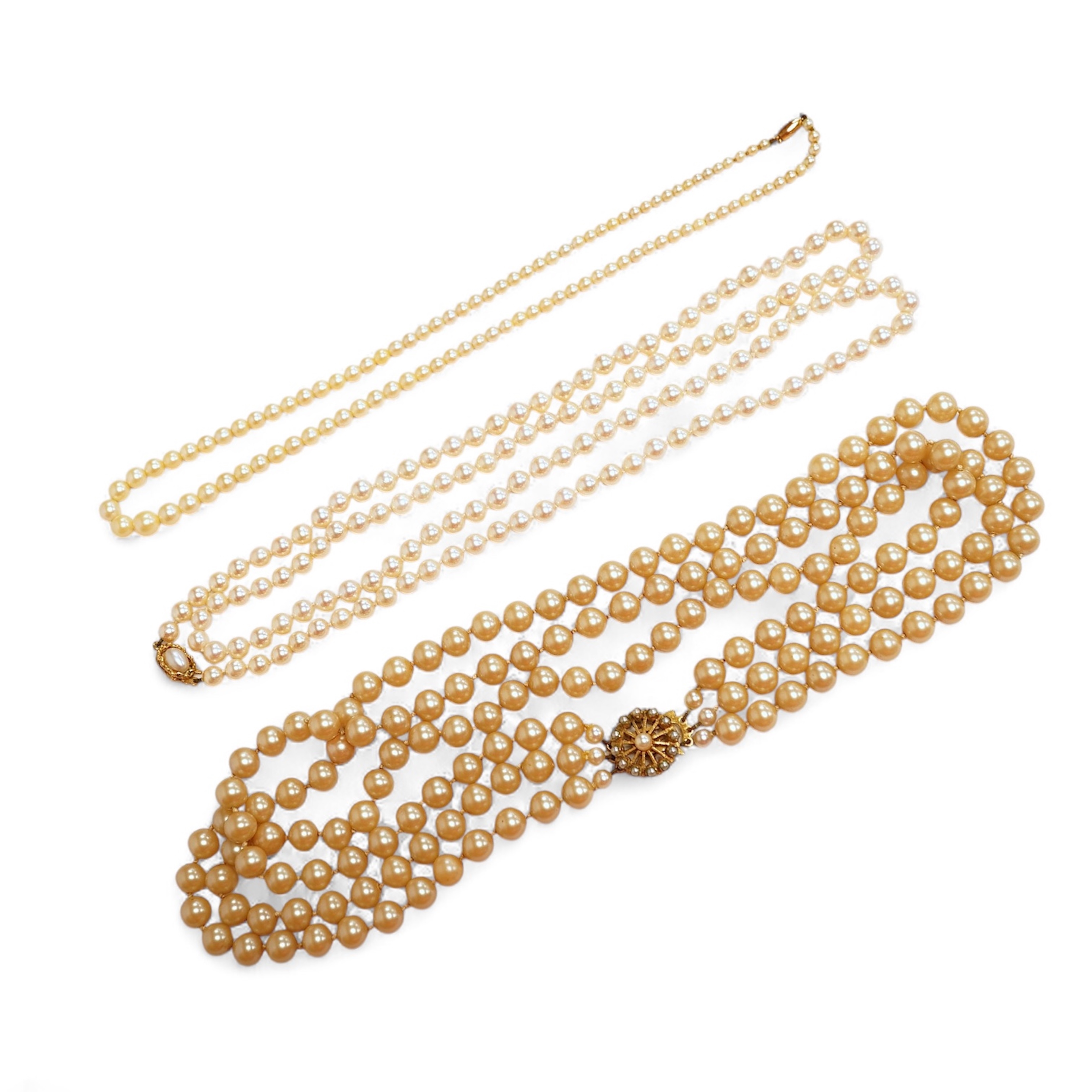 Two cultured pearl necklaces, each composed of a single row of cultured pearls, one with pearls 3-7mm diameter, length 44cm, clasp stamped 9CT; the other with pearls approximately 6mm diameter, length 86cm, clasp with Br
